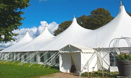 a line of portable toilets in a shaded area, offering a comfortable experience for users in Ben Lomond